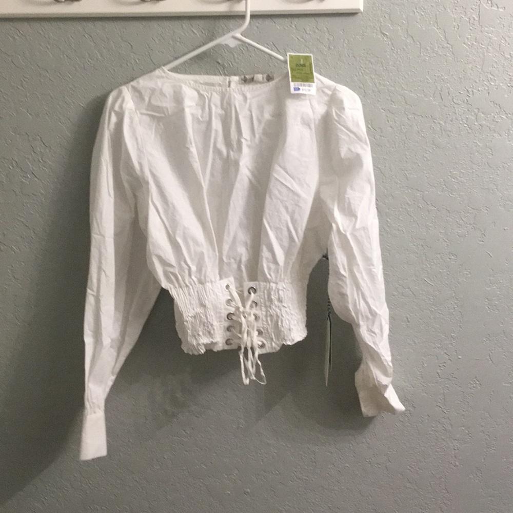 White top with lace up waist